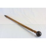 Antique 19th Century mallaca walking stick cane, the handle a coconut profusely carved