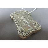 Silver vesta case with embossed image of an Art Nouveau style figure