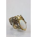 Arts & Crafts style Gold mounted Opal ring, with a Sea theme to include white metal Fish