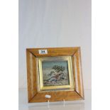 Maple framed & glazed tapestry of a regency figure reclining with dogs