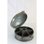 Early 19th century Circular Spice Tin , the hinged domed lid opening to reveal seven compartments