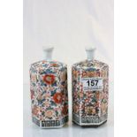 Two six sided oriental bottle vases with floral decoration