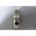 Silver owl shaped whistle