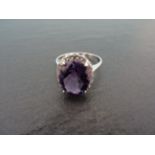 A large silver and amethyst CZ ring