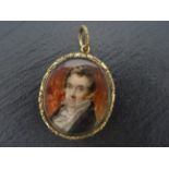 19th Century Gold locket with painted Miniature of a Gentleman