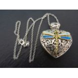 A fine silver and opal heart shaped locket