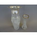 Two vintage cut glass vases, one with large German hallmarked Silver rim, the other with rubbed