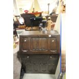 Early 20th century Oak Bureau / Cupboard with Linenfold Carving and makers label ' L Marcus Ltd '