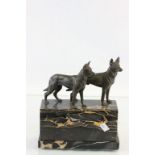 Pair of bronze Alsatian dogs on a large Marble plinth