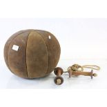 Vintage leather Medicine ball and a vintage skipping rope with Industrial bobbin handles