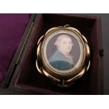 Boxed yellow metal brooch with painted Ivory miniature of a Regency gentleman