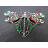 A large silver and plique a jour dragon fly brooch