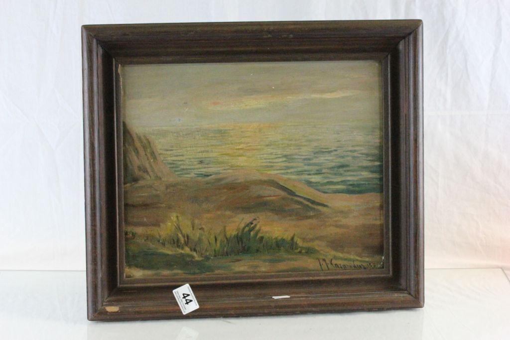 Wooden framed Oil on board of a Coastal scene, signed by artist