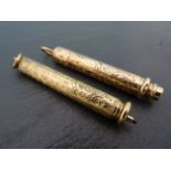 Two Hallmarked 9ct Gold pencils to include a combination example