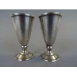 Pair of Russian hallmarked Silver Vodka cups with gilt wash interior