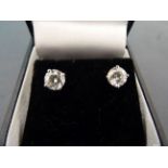 A pair of 14ct W/G substantial diamond stud earrings of 1.5cts