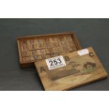 Inlaid wooden Japanese box with alphabet blocks inside