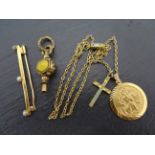 9ct Gold St Christopher pendant, gold brooch & a stone set gold watch key