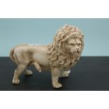 A continental ceramic lion figure numbered to base