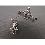 A late Victorian silver and Marcasite "Hanging Monkeys" brooch