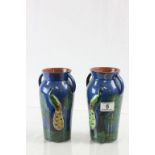 Pair of Royal Torquay Pottery twin handled vases with Peacock design