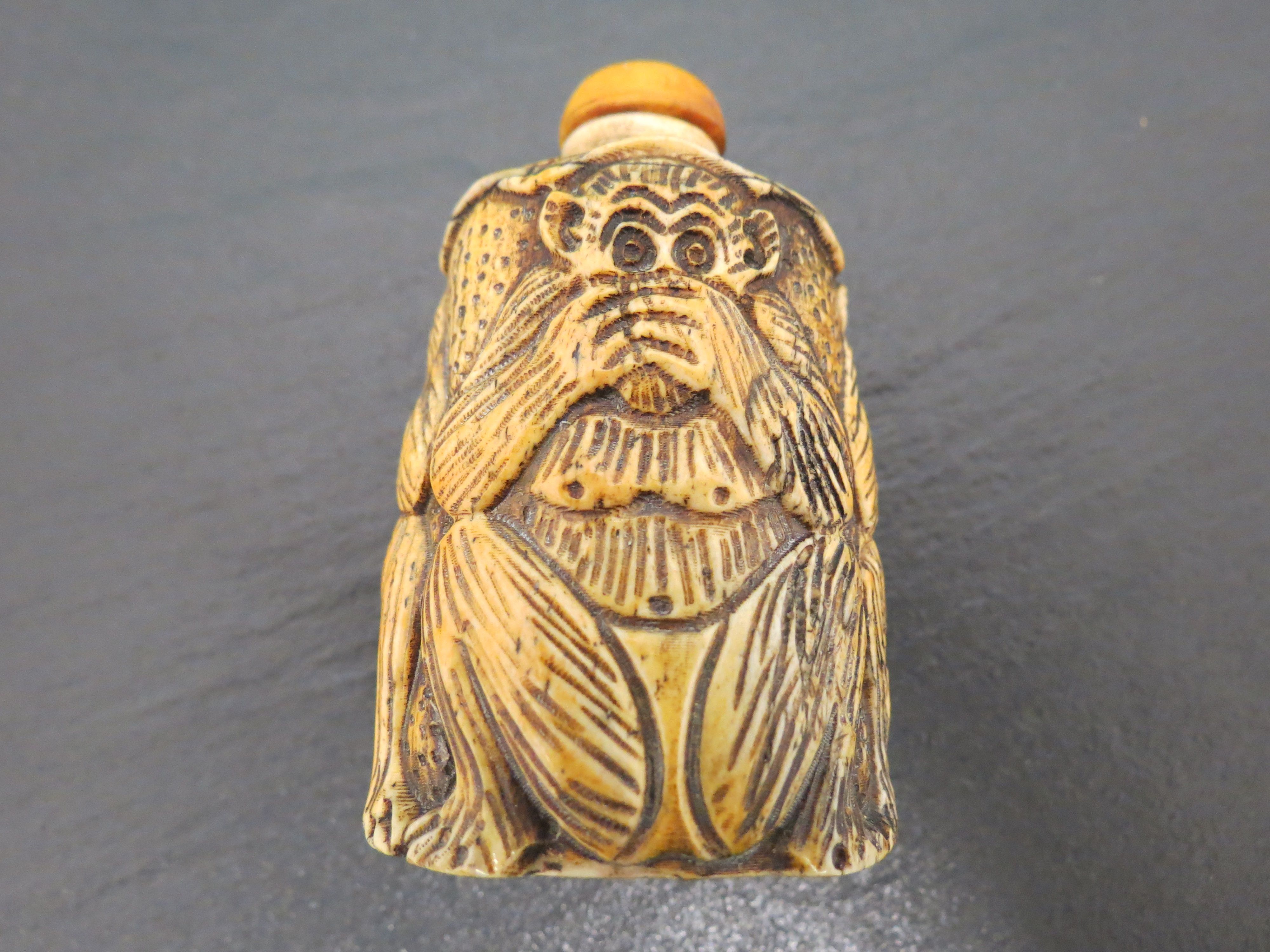 Bone snuff bottle in the form of hear no, see no, speak no evil monkeys