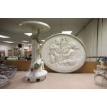 A contemporary ceramic jardiniere stand with flower and bird decoration and a plaster plaque with