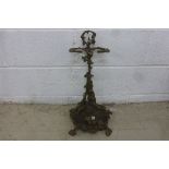 Brass/bronze Art Nouveau style stick stand with gun and gundog decoration