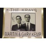 TV Autographs - Framed & glazed 'The Krays' signed picture by Martin & Gary Kemp with coa