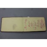 Cricket autographs - An autograph book containing a number of signatures including Don Bradman,