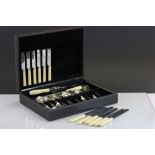 A cased set of silver plated flatware.