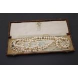 Four vintage Pearl necklaces to include one with 9ct Gold clasp & spacers in a vintage necklace box