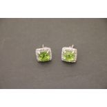 Pair of silver cz and peridot earrings