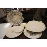 Eight items of Belleek to include Christmas plates, 1870 saucer, plus international collection