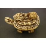 Chinese Figure of a Tortoise carrying two Smaller Tortoise on his back