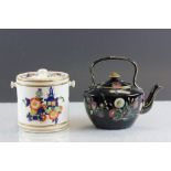 19th century ceramic teapot with enamelled floral decoration & a Devon Ware lidded biscuit barrel
