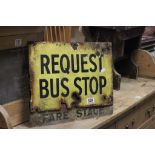 A vintage double sided bus stop sign.