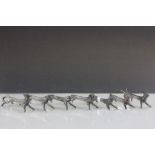 Seven metal antique knife rests in the form of various animals.