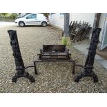 Pair of Large Georgian Iron Fire Dogs with Egyptian Gods design together with an Iron Fire