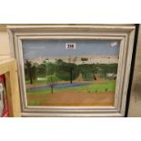 Framed gouache painting of a town viewed through parkland