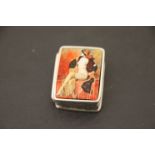 Silver pill box with nude enamel pictorial to lid
