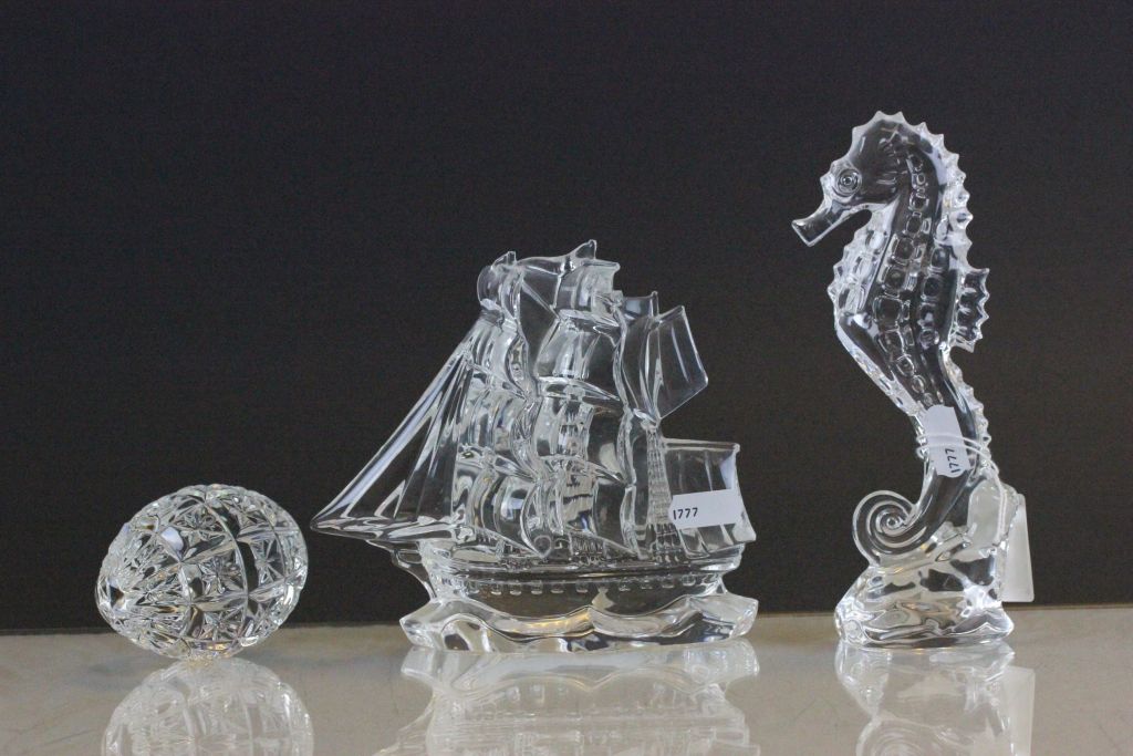 Three Waterford Crystal sculptures to include a Galleon, a Seahorse & an Egg