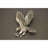 A silver American eagle brooch set with marcasites