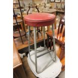 Industrial Tall Stool with Red Leatherette Padded Seat and Tubular Metal Base