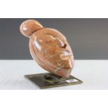 Asian carved stone head on heavy Brass base