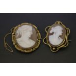 Two vintage Cameo Brooches with yellow metal mounts