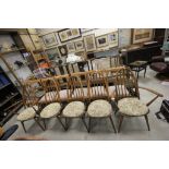 Set of Six Ercol 'Golden Dawn ' Elm Seated Hoop Back Dining Chairs (including Two Carvers )