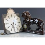 Two vintage Clocks to include a Treacle glaze type in the form of a Lion