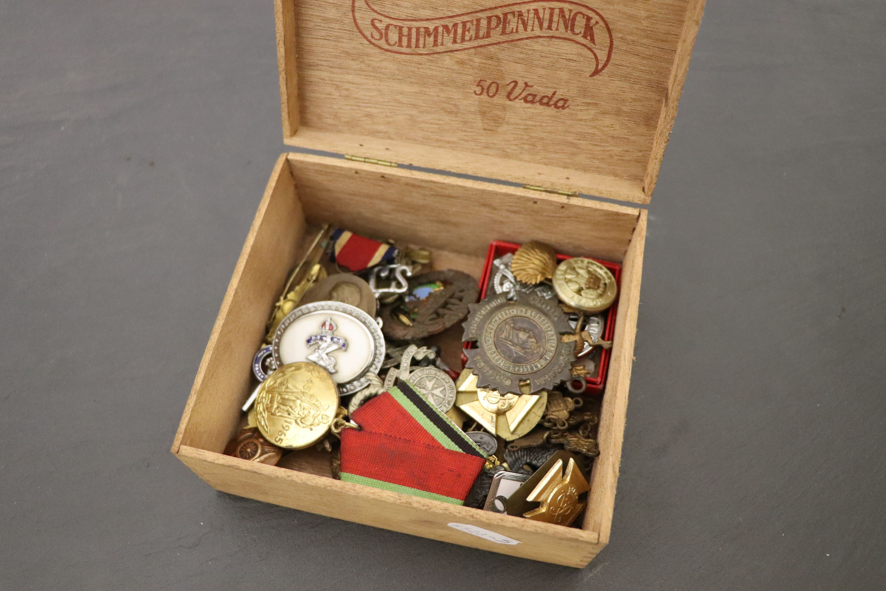 Box of mixed badges including military