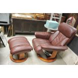 Contemporary Burgundy Leather Upholstered Armchair and matching Footstool